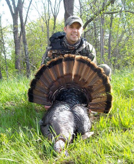 Jerod Smothers with a Missouri Eastern turkey taken with a Benelli Nova 12 Gauge. Jerod Smothers with a Missouri Eastern turkey taken with a Benelli Nova 12 Gauge.