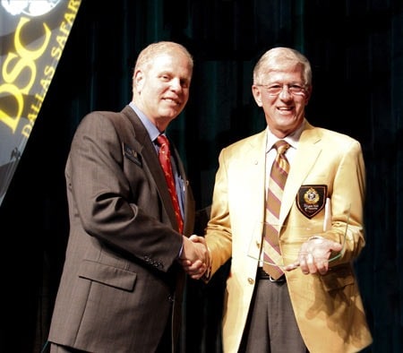 Past DSC President George Chamblee (Left) presenting the sponsorship appreciation plaque to Larry Potterfield, Founder and CEO of MidwayUSA, at the 2011 DSC convention.