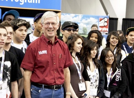 MidwayUSA Founder and CEO Larry Potterfield with Dallas, TX High School Students