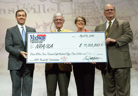 L-R: Chris Cox Executive Director of NRA-ILA, Larry and Brenda Potterfield, and Jim Porter, NRA President