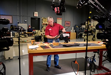 Larry on set filming a commercial ad