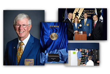 Photos from winning the first Baldrige award, and passing the President position of the company